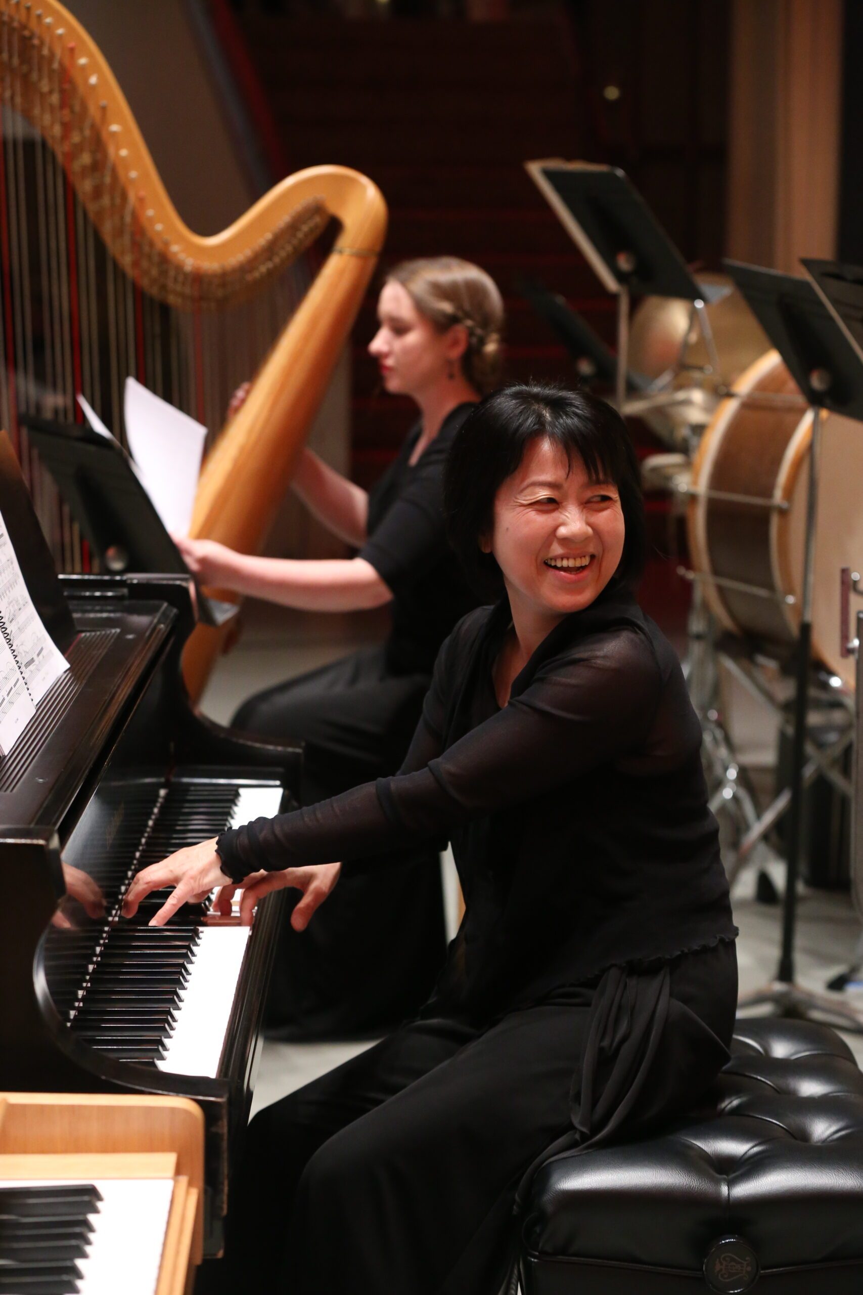 symphony prinicpal keyboard reiko yamada smiles while performing