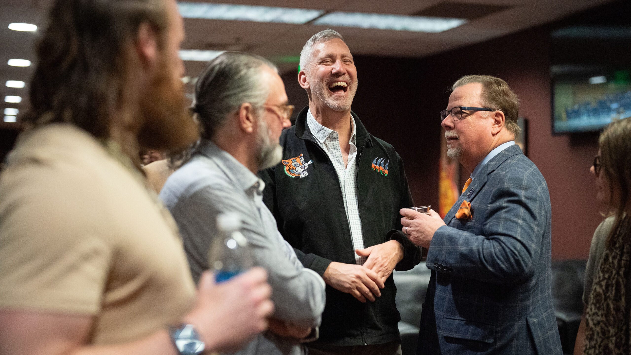 people laughing at concert intermission