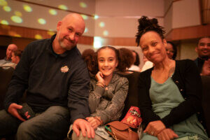 family at candlelight concert